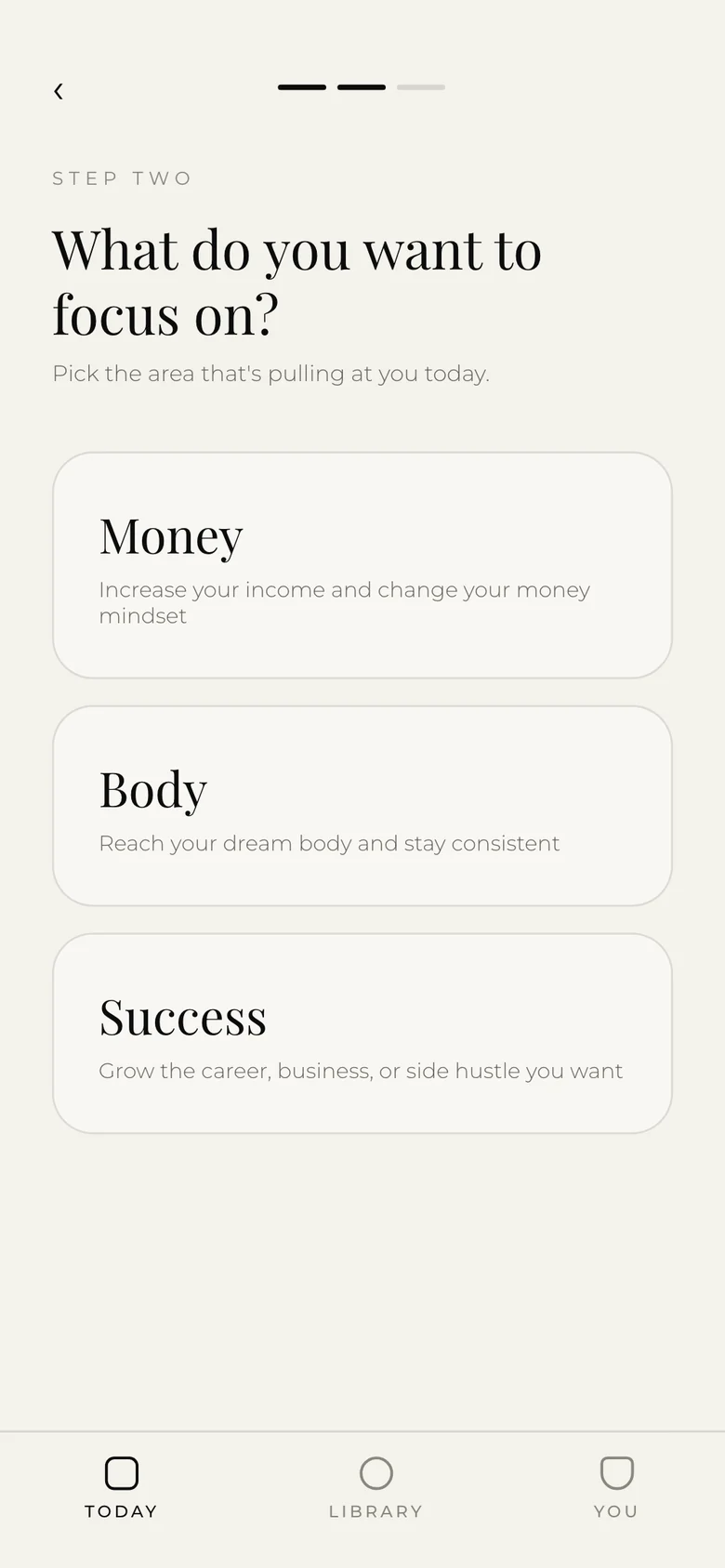The app asking what you want to focus on: money, body or success.